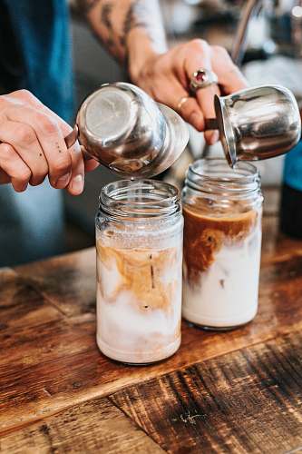 bar nine person pouring liquid on drinking glasses culver city